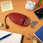 Compact keyholder pouch with metal keychain ring on display