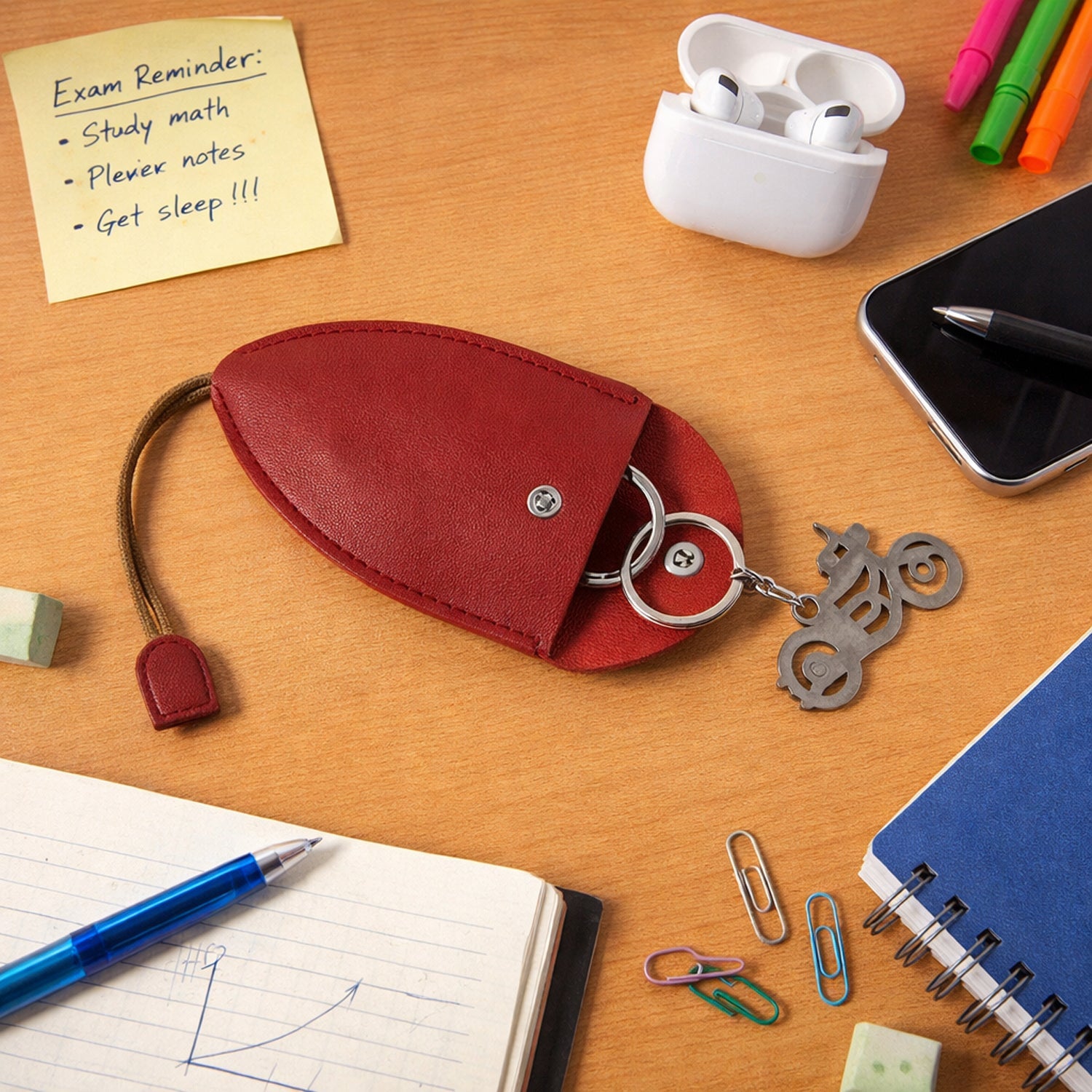 Compact keyholder pouch with metal keychain ring on display