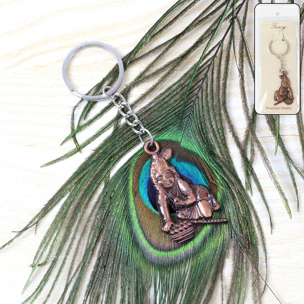 Bal Krishna keychain in crawling pose made from durable metal
