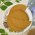 Pack of Maniarr's Carmonised Ragi Khakhra (180g) showing crispy texture.