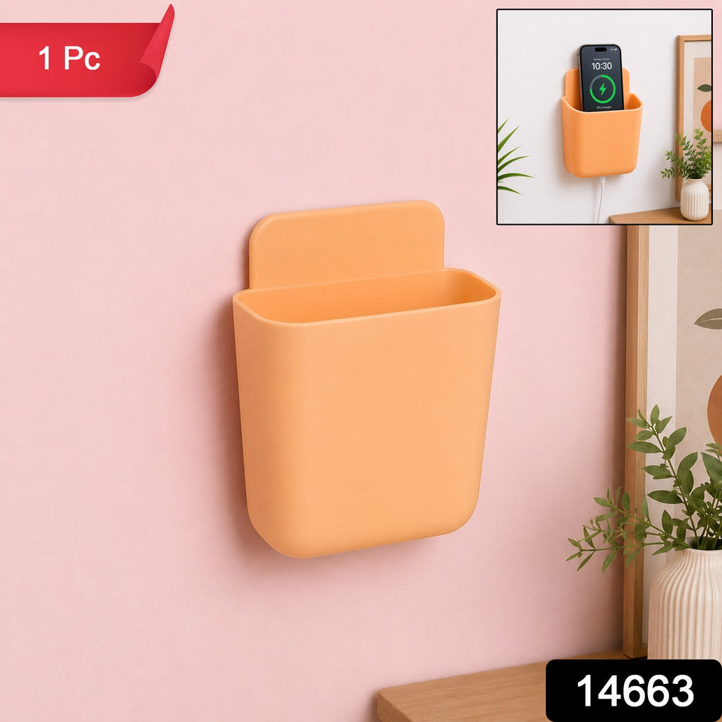 Close-up view of plastic wall mounted storage pocket with keys and phone