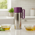 750ml stainless steel oil pourer with anti-drip spout on kitchen counter
