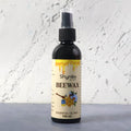 Beeswax Furniture Polish spray bottle highlighting natural ingredients for wood and leather care.