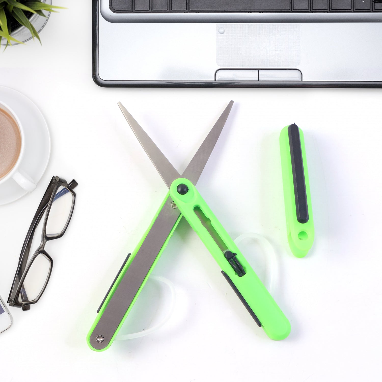 FERVENT Pen Scissors, compact and portable, shown closed with its safety cap.
