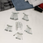 Versatile metal safety pins used for tailoring and daily utility