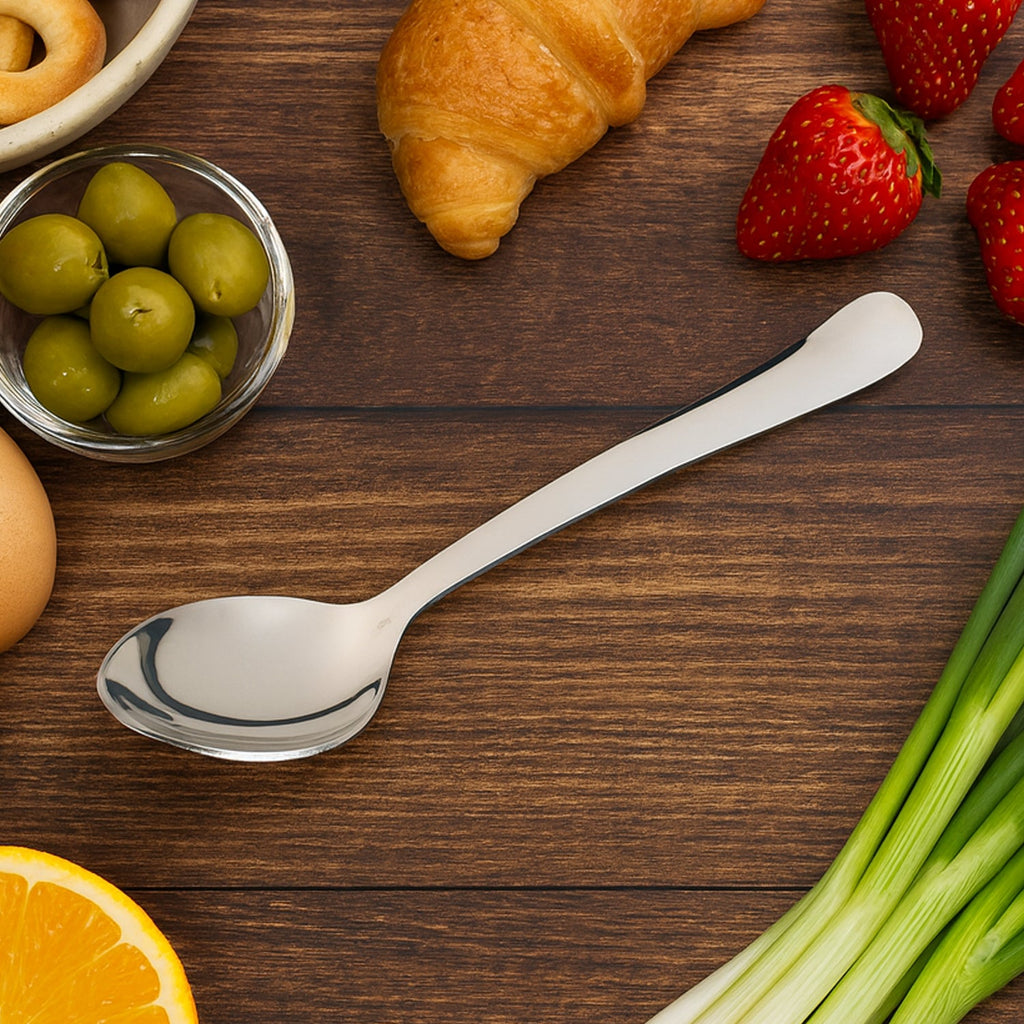 Close-up of a single Stainless Steel Dining Spoon with a bright mirror finish.