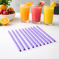 Set of reusable plastic drinking straws for juice and cold drinks