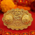 Ganesh embossed roli chawal kumkum chopra with dual holders and antique gold finish on oval tray