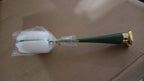 Ergonomic long handle bottle brush demonstrating its reach into a narrow-necked bottle.