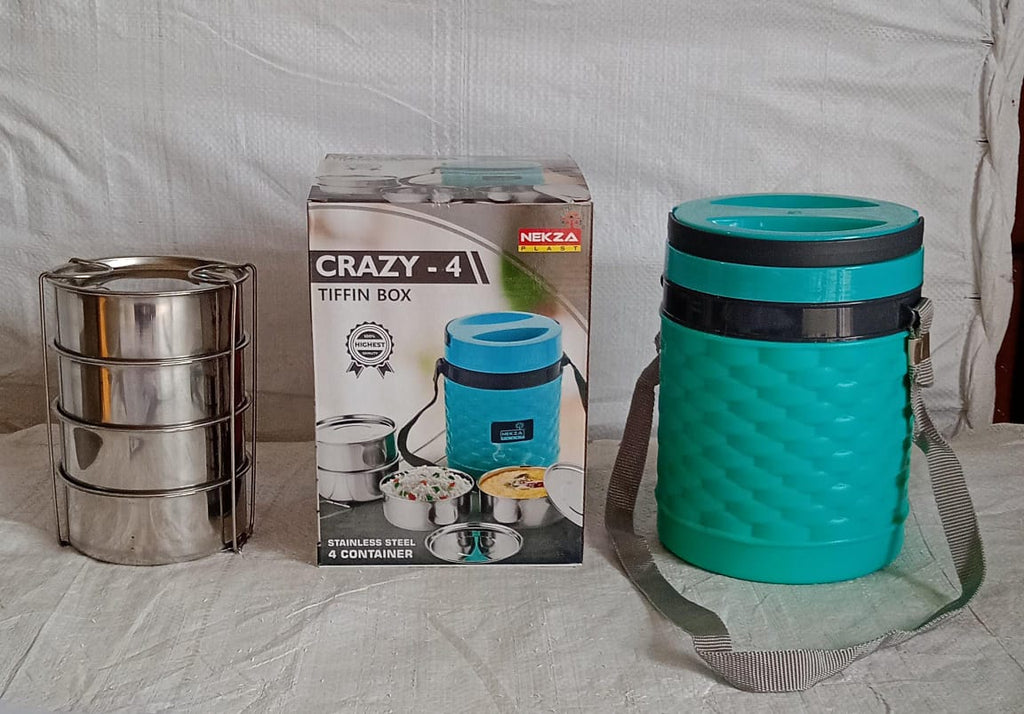 Person carrying the Nekza insulated tiffin by its handle, showcasing portability.