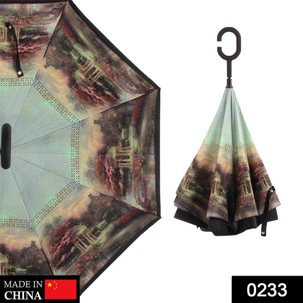 Close-up of the automatic button on the stylish metal handle of the reverse umbrella.
