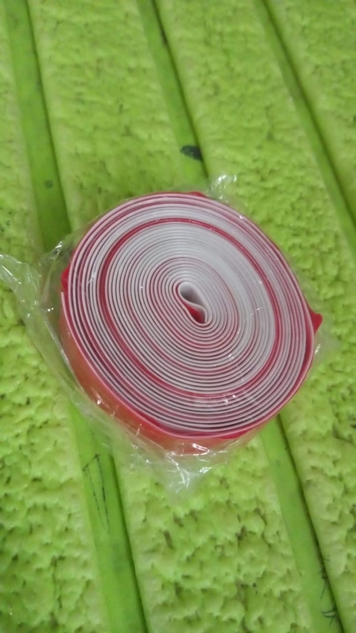 Waterproof sealing tape protecting a kitchen countertop from spills.
