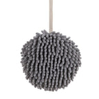Plush hanging hand towel with convenient loop for easy placement.
