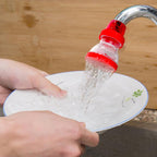 Compact plastic 360-Degree Shower Head attached to a tap, showing its flexible design.