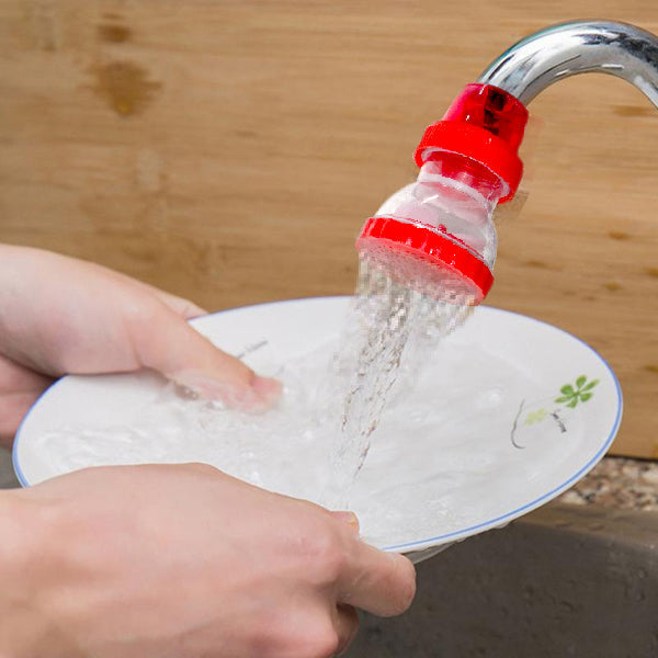 Compact plastic 360-Degree Shower Head attached to a tap, showing its flexible design.