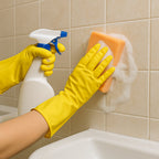 Two pairs of durable yellow rubber gloves for various cleaning tasks.