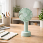 Front view of the portable handheld fan, ready for use with its included battery.