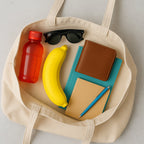 Detail of the secure snap lock mechanism on the yellow banana case.