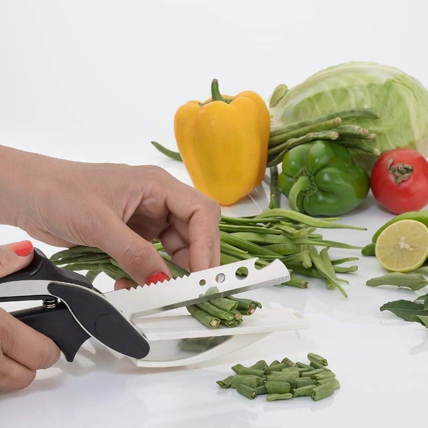 Close-up of the clever cutter's stainless steel blade and built-in cutting board.
