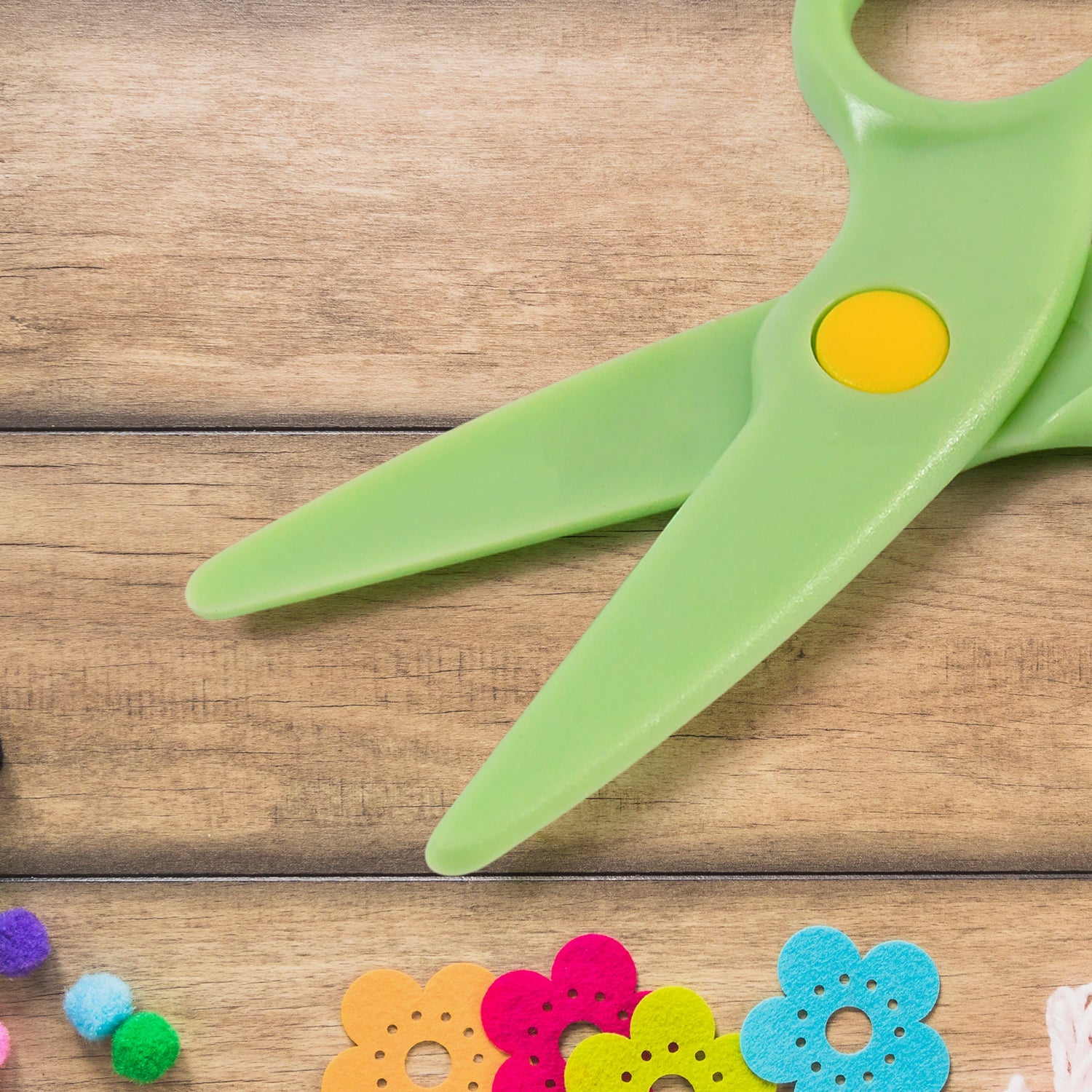 Close-up of plastic safety scissors blades with rounded tips for safe cutting
