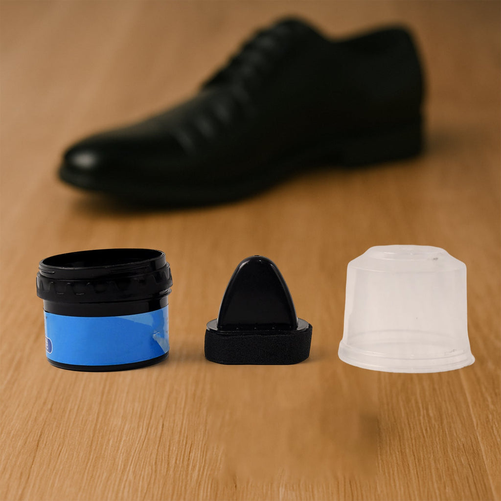 Instant shoe shine sponge placed beside polished leather shoes