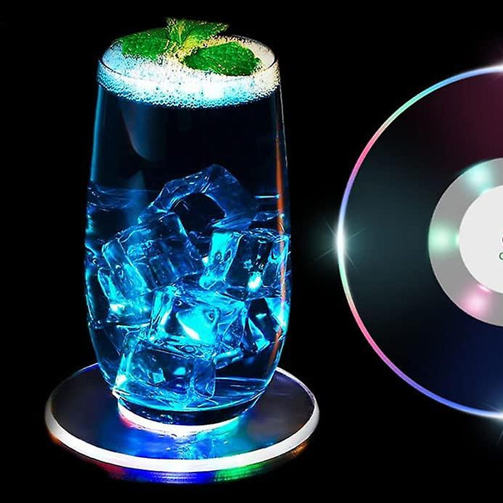 Round LED cocktail coaster switched on, displaying festive colorful lights.