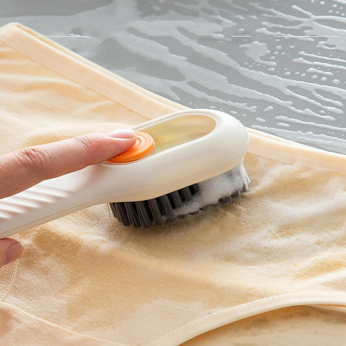 Scrubbing brush with dispenser from Velvet Wipe for multi-purpose cleaning.