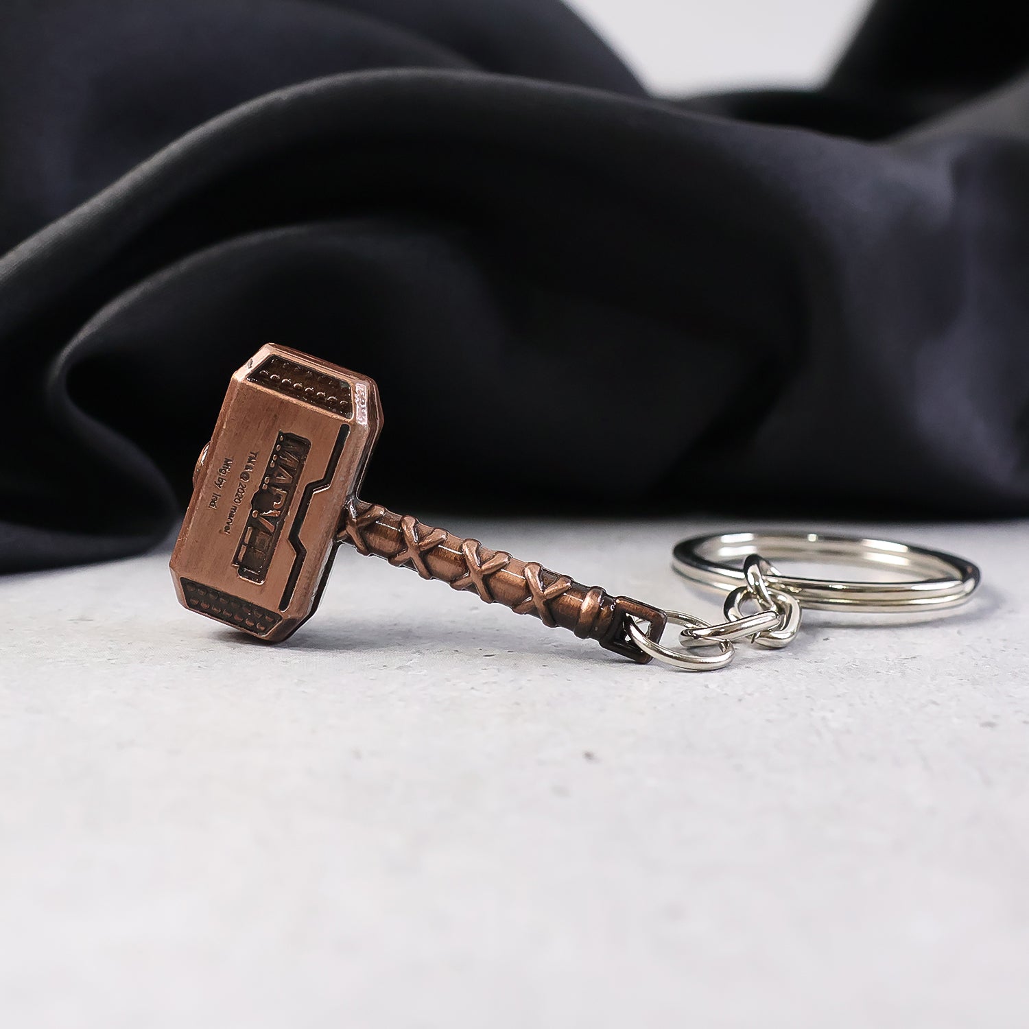 Miniature hammer shaped keychain on keyring loop
