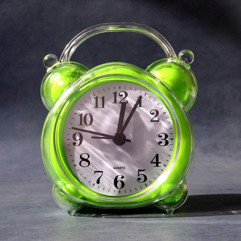 Analog alarm clock showing precise time with clear hour and minute hands