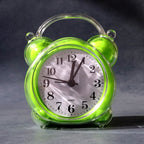 Analog alarm clock showing precise time with clear hour and minute hands