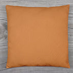 A beige couch pillow cover with an invisible zipper closure for easy use.