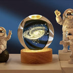 Close-up of 3D Crystal Ball Lamp showing detailed engraving and sturdy wooden base.