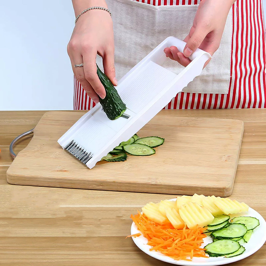 Complete 3-piece kitchen grater set including peeler, grater, and slicer