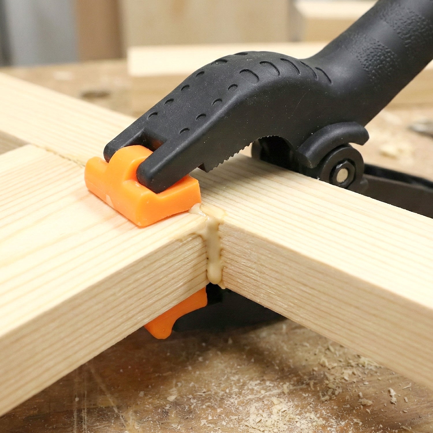 High tension spring clamp gripping a piece of fabric securely