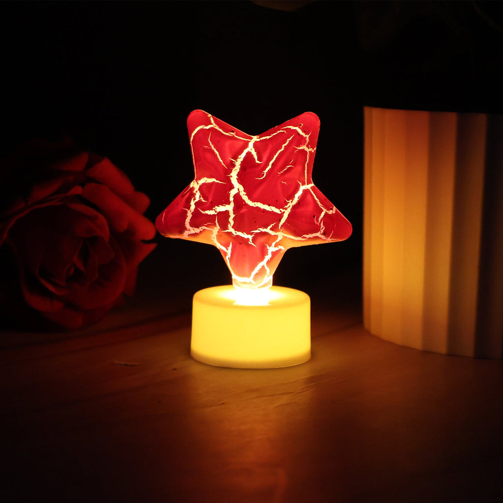Single star shape decorative LED tealight candle showing battery base