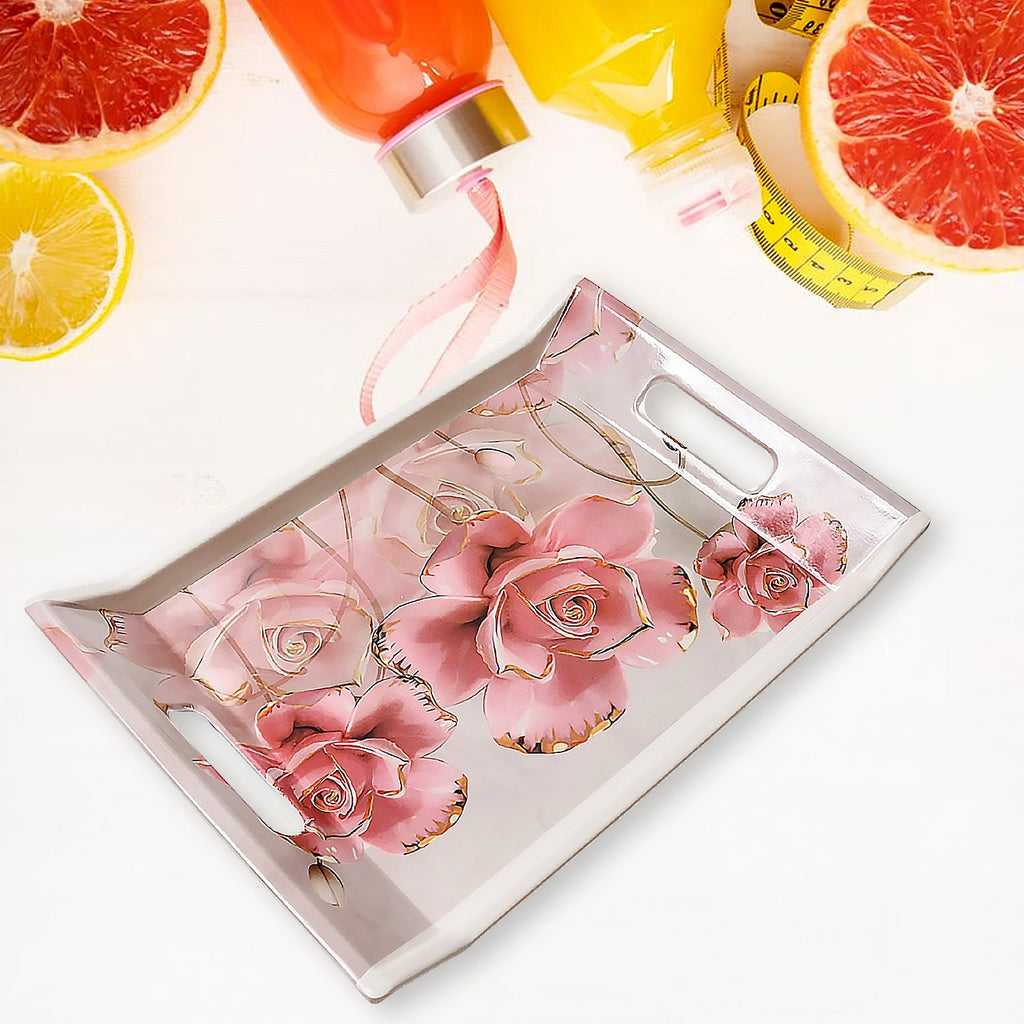 Small rectangular plastic serving tray with a decorative floral pattern.