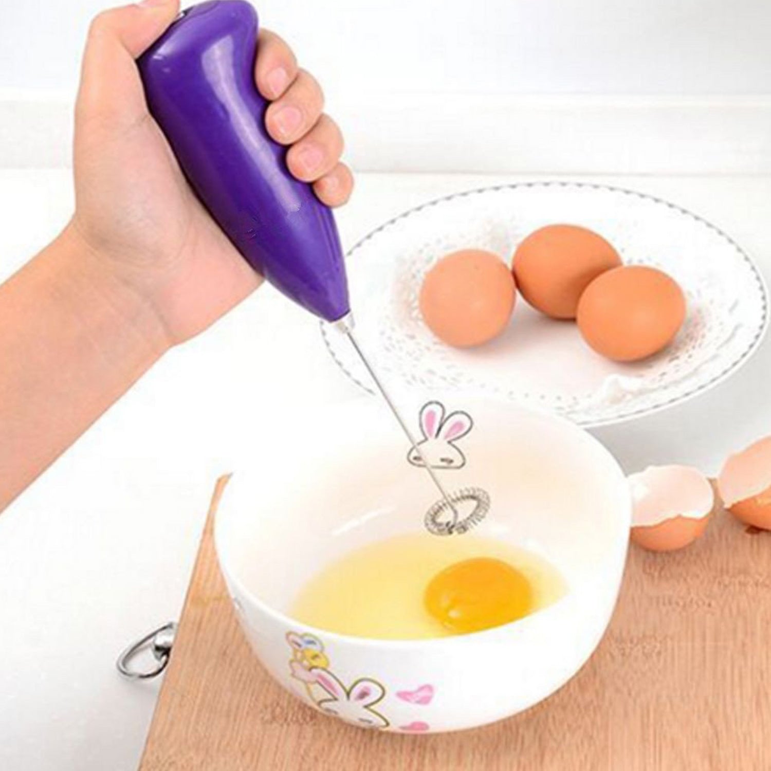 XcelCraft Hand Blender in action, mixing ingredients in a bowl for smooth results.