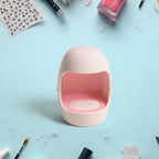 Plug-in LED nail dryer front view highlighting control button