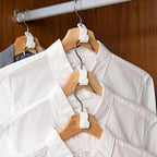 Hanger connector hook attached to a clothes hanger, demonstrating vertical storage.