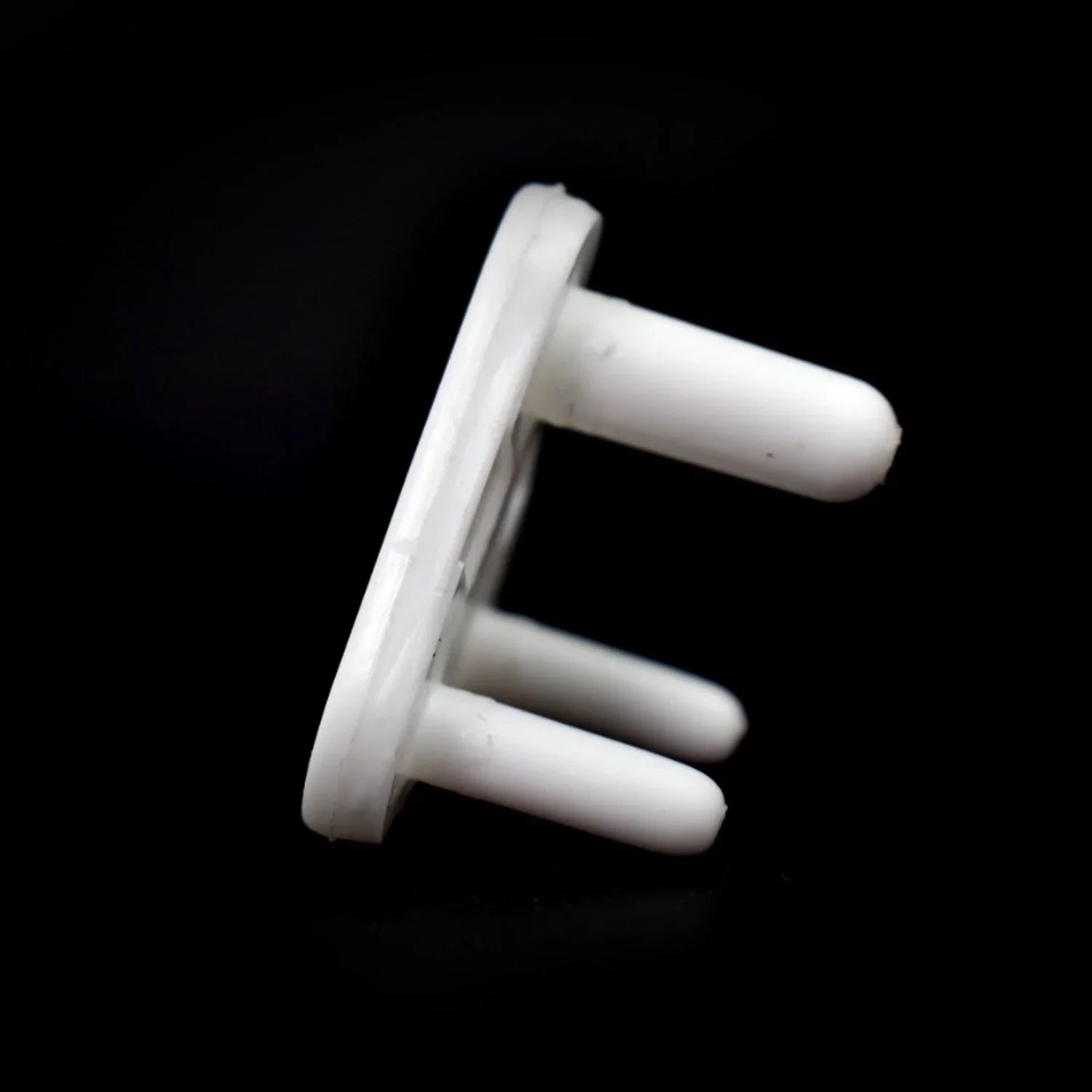 Multiple angles of the large electric socket cover in white.