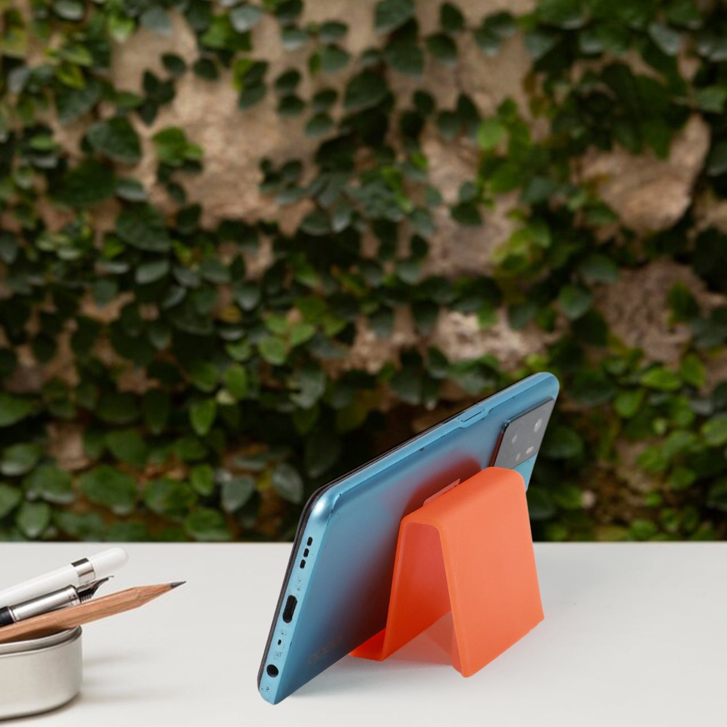 Anti-slip base of plastic phone stand preventing slippage