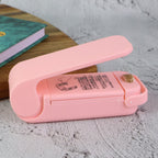 The Mini Plastic Bag Sealer in its closed, secure position.