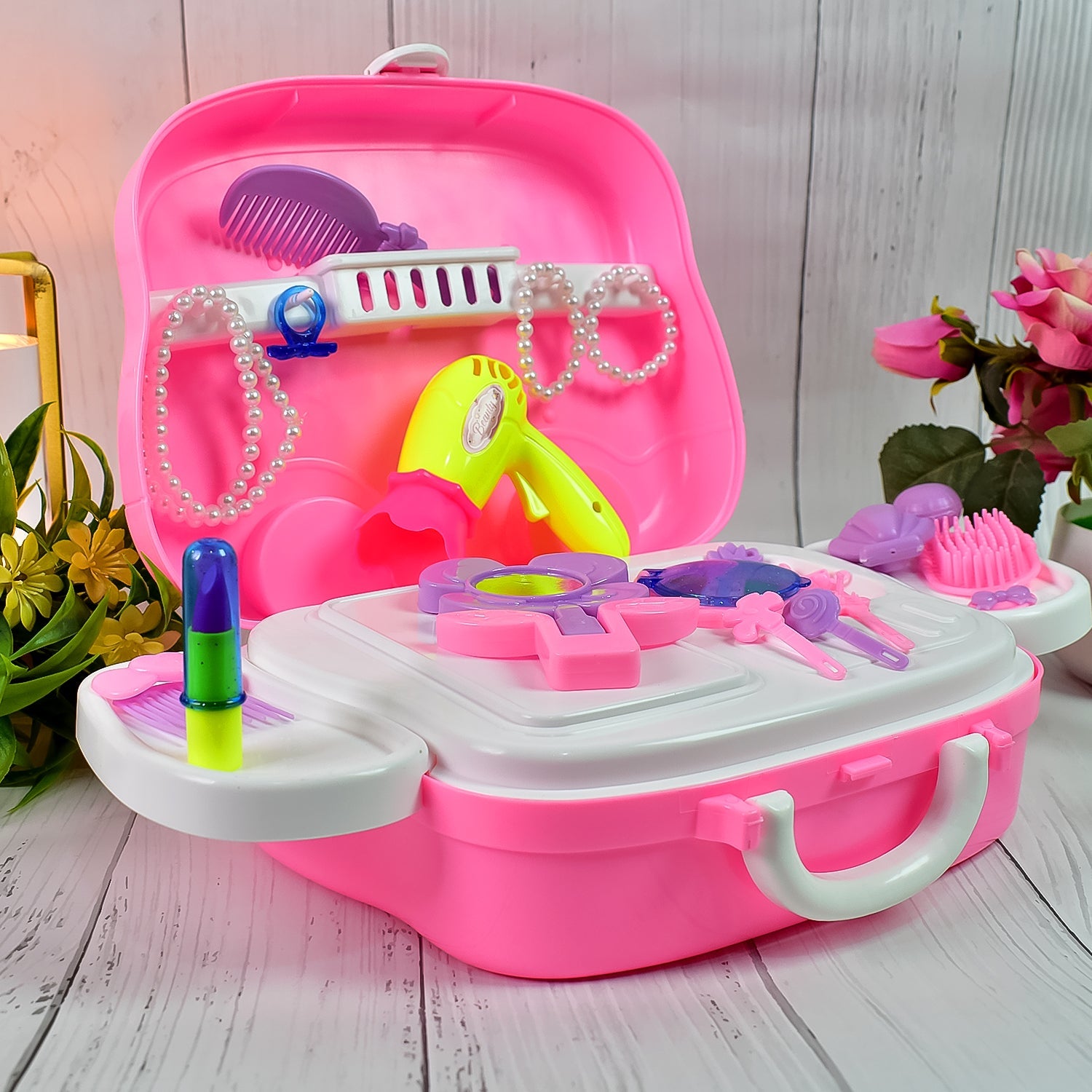 Close-up of the kids' cosmetic toy set with mirror and accessories.