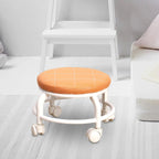 Side view of the portable rolling stool highlighting its sturdy wheels.