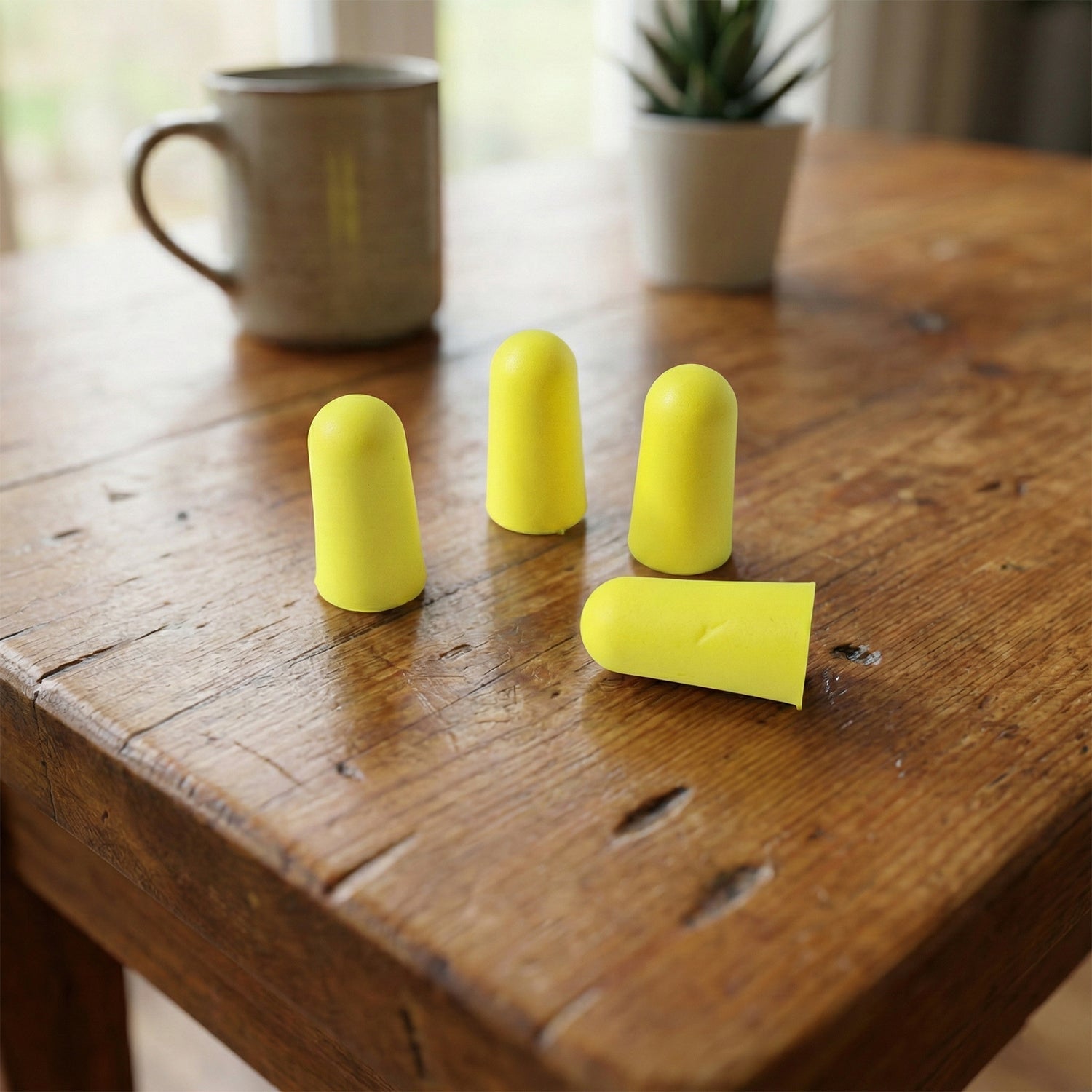 Soft foam ear plugs suitable for travel, work, and noisy environments