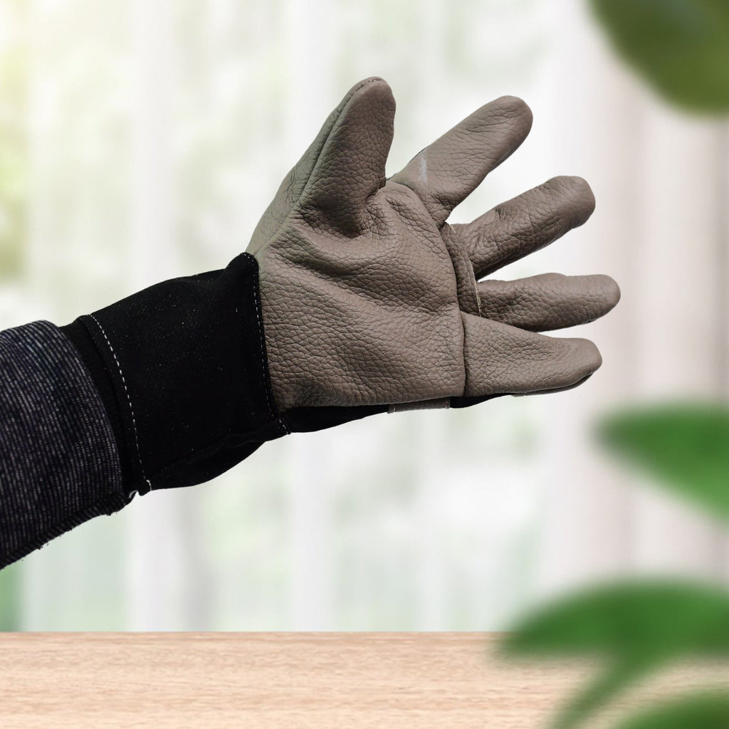 Close-up of the premium leather texture on BraveVault gardening gloves.
