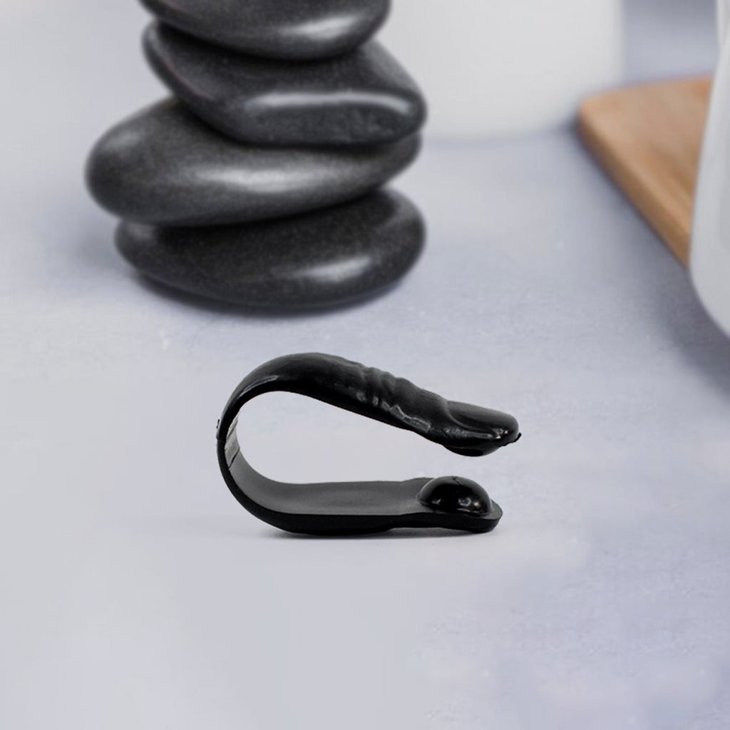 LI4 Acupressure Point Clip clipped on hand, close-up view