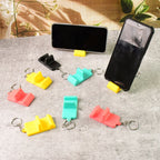 Compact 2-in-1 mobile stand keychain in assorted colors