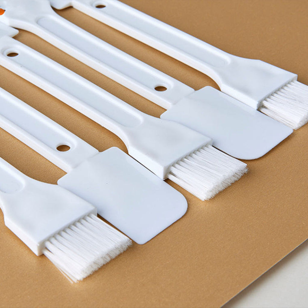 Compact cleaning tool for tight spaces and crevices.
