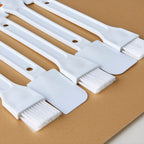 Compact cleaning tool for tight spaces and crevices.